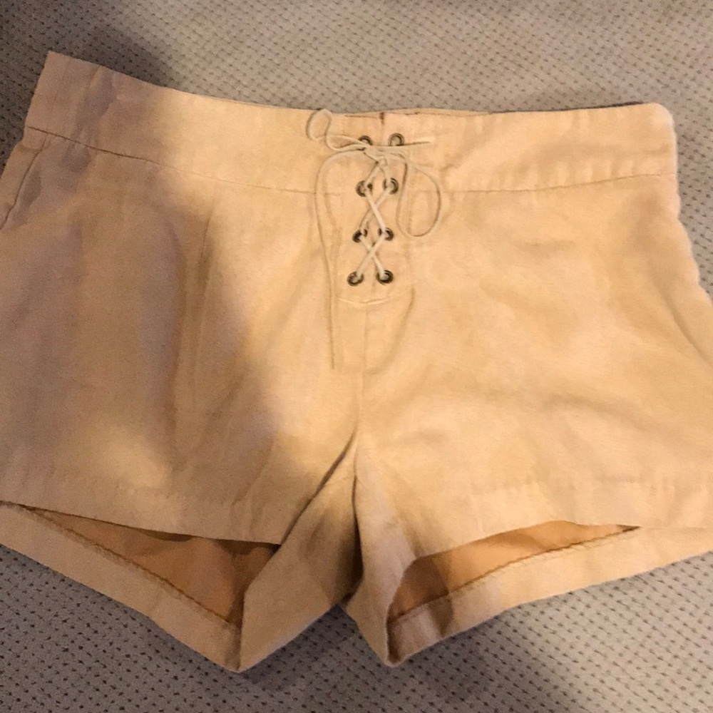 Shorts with zip side and tie front camel color